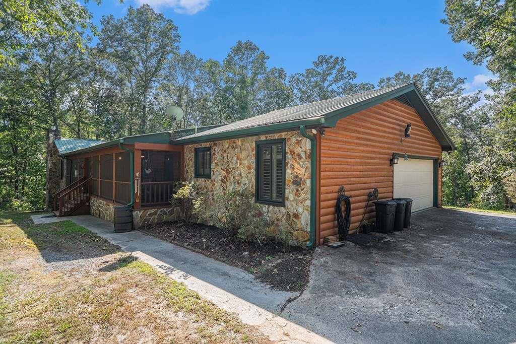 370 Davis Road Blue Ridge, GA 30513 - Photo 4 of 47 a view of a house with backyard and sitting area