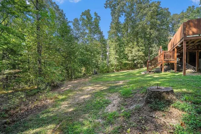 a view of a house with big yard
