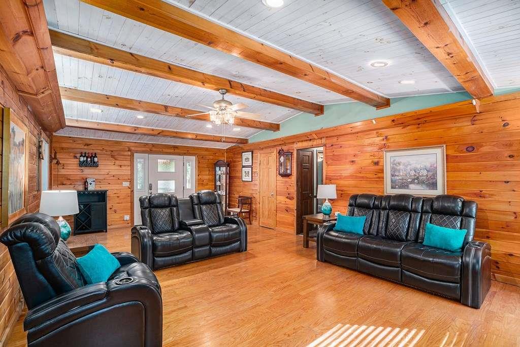 370 Davis Road Blue Ridge, GA 30513 - Photo 7 of 47 a living room with furniture and a large window