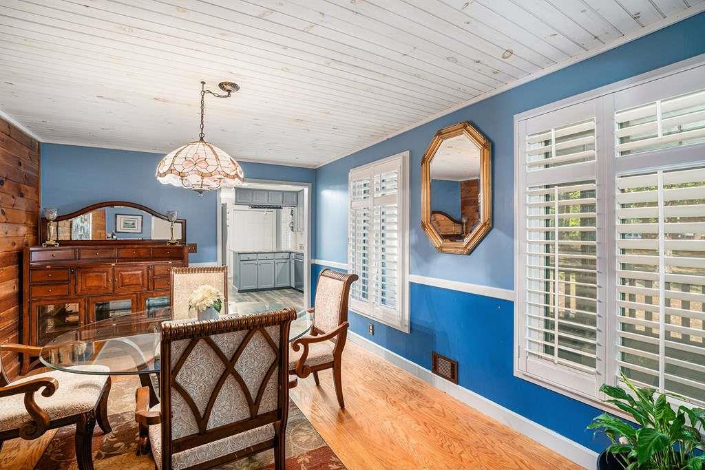 370 Davis Road Blue Ridge, GA 30513 - Photo 8 of 47 a view of a dining room with furniture window and wooden floor