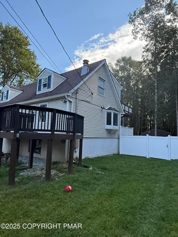 a house view with a garden space