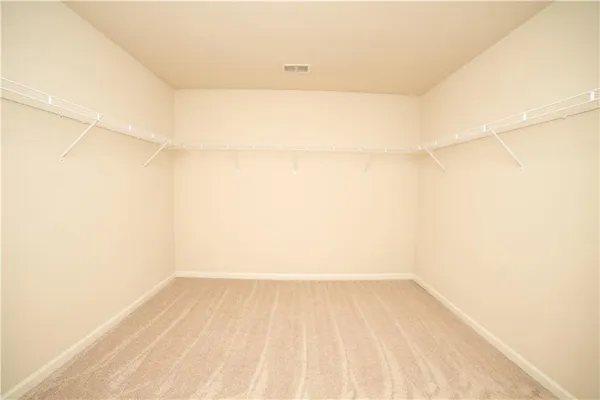 a view of a room with an empty space