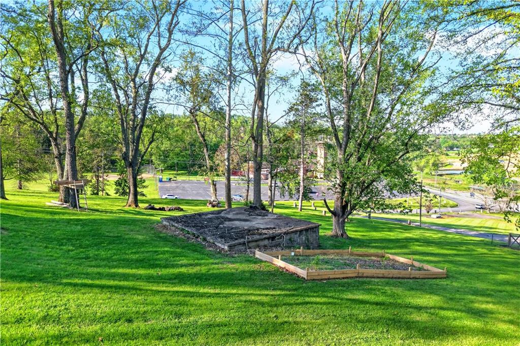 1188 Willowbrook Road Belle Vernon, PA 15012 - Photo 9 of 50 a view of a park with trees and grass