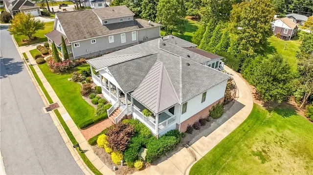 an aerial view of a house with a garden