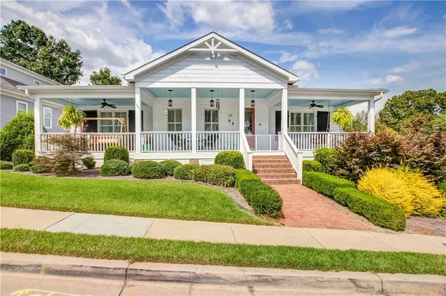 front view of a house with a yard