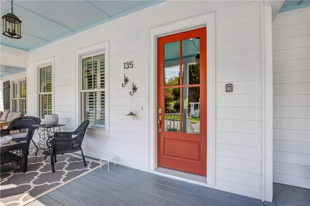 a view of a livingroom with furniture and windows