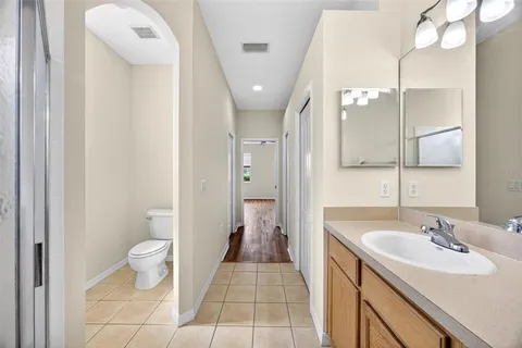 a bathroom with a sink and mirror