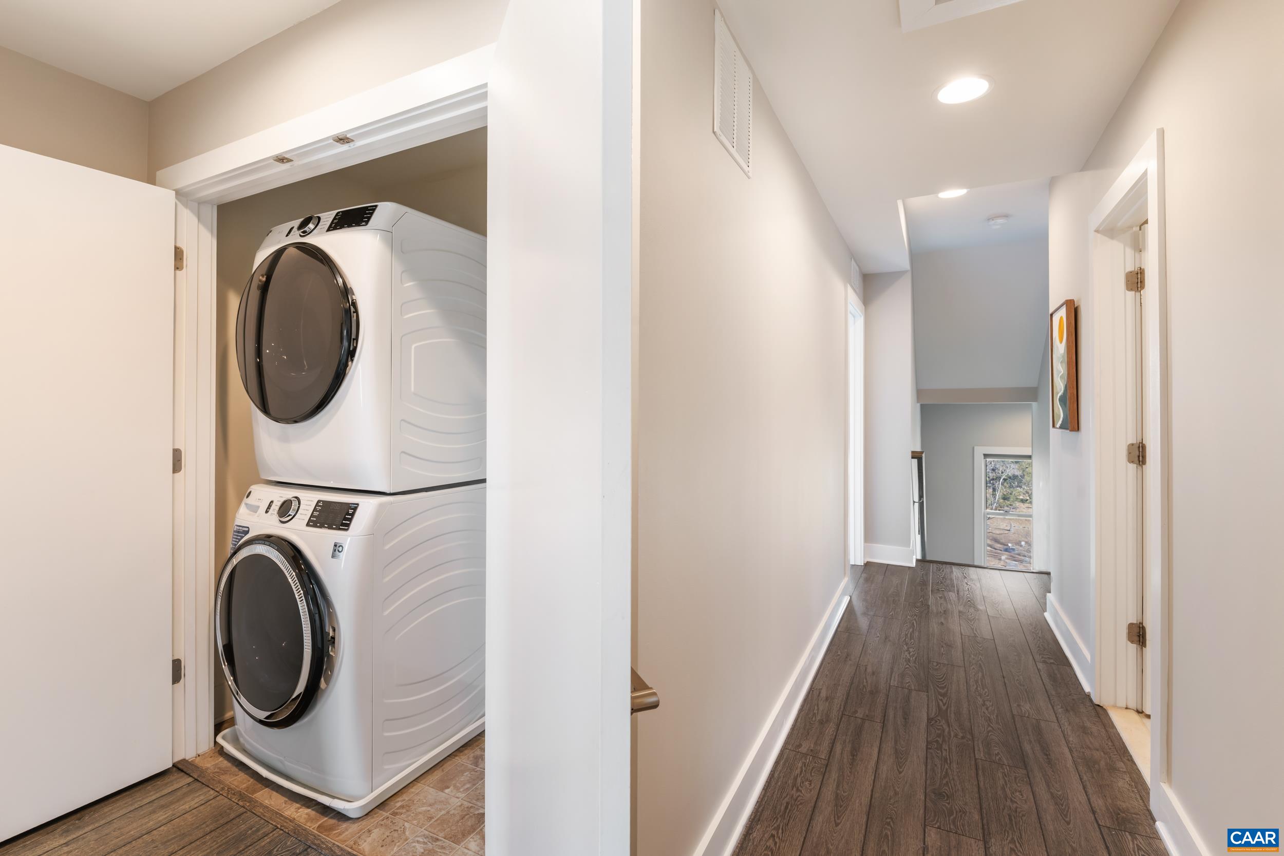 137 Almere Avenue Charlottesville, VA 22902 - Photo 17 of 36 a view of a hallway with washer and dryer
