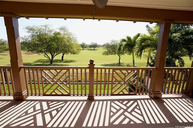 a view of a street view from a balcony