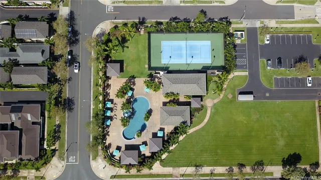 an aerial view of a residential houses with outdoor space