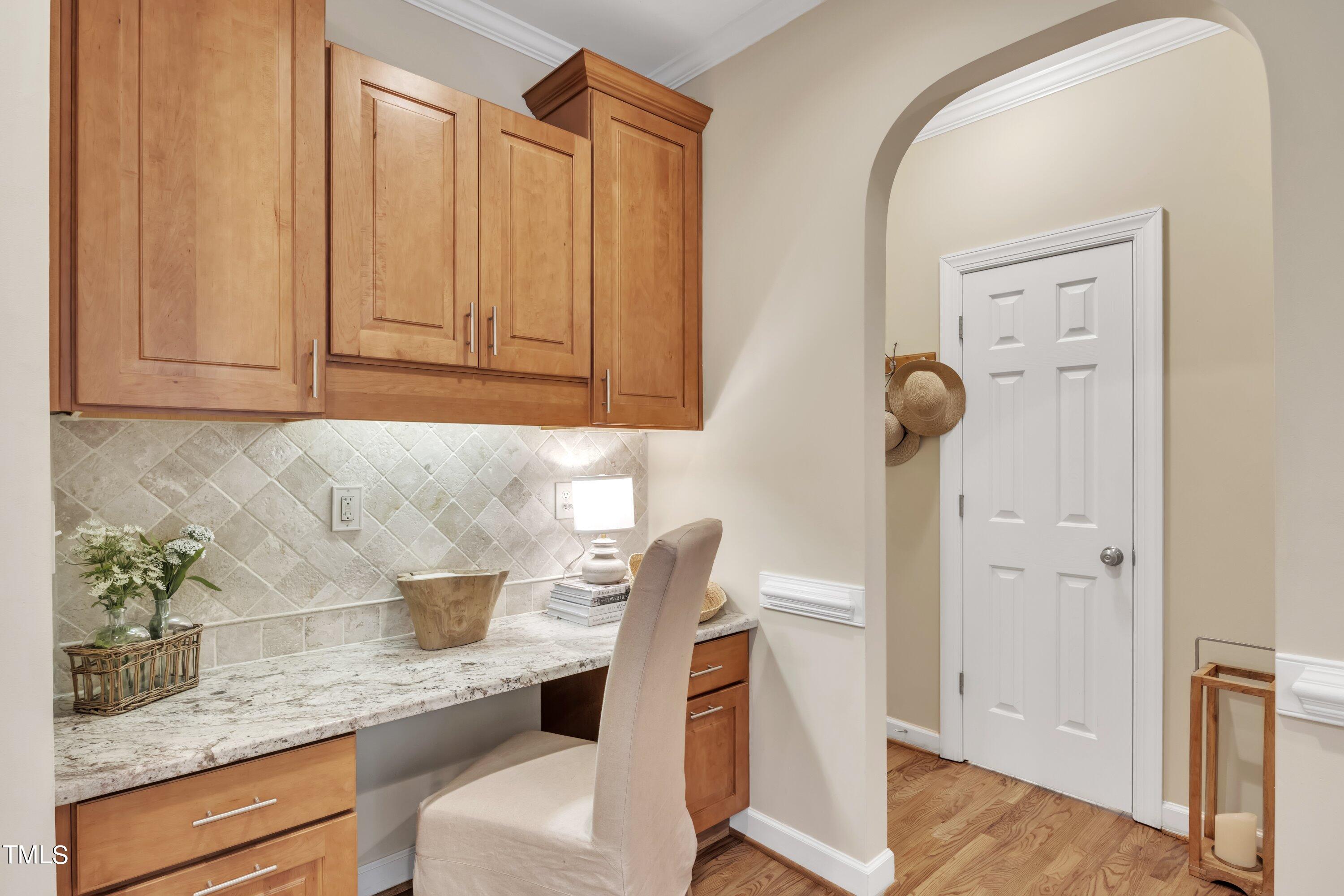 12208 Jasmine Cove Way Raleigh, NC 27614 - Photo 12 of 57 a kitchen with stainless steel appliances granite countertop a sink and a refrigerator