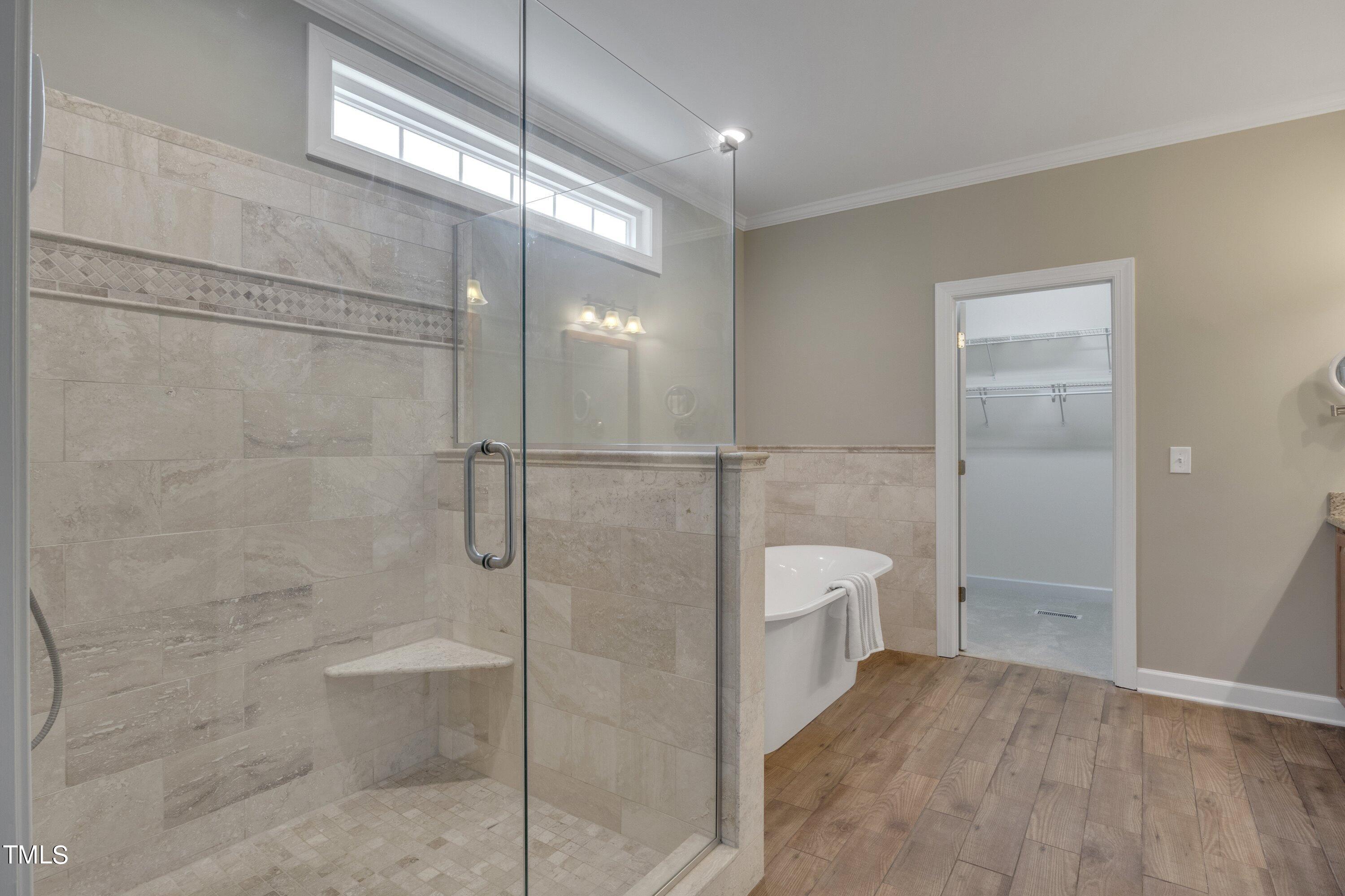 12208 Jasmine Cove Way Raleigh, NC 27614 - Photo 32 of 57 a bathroom with a shower and a toilet
