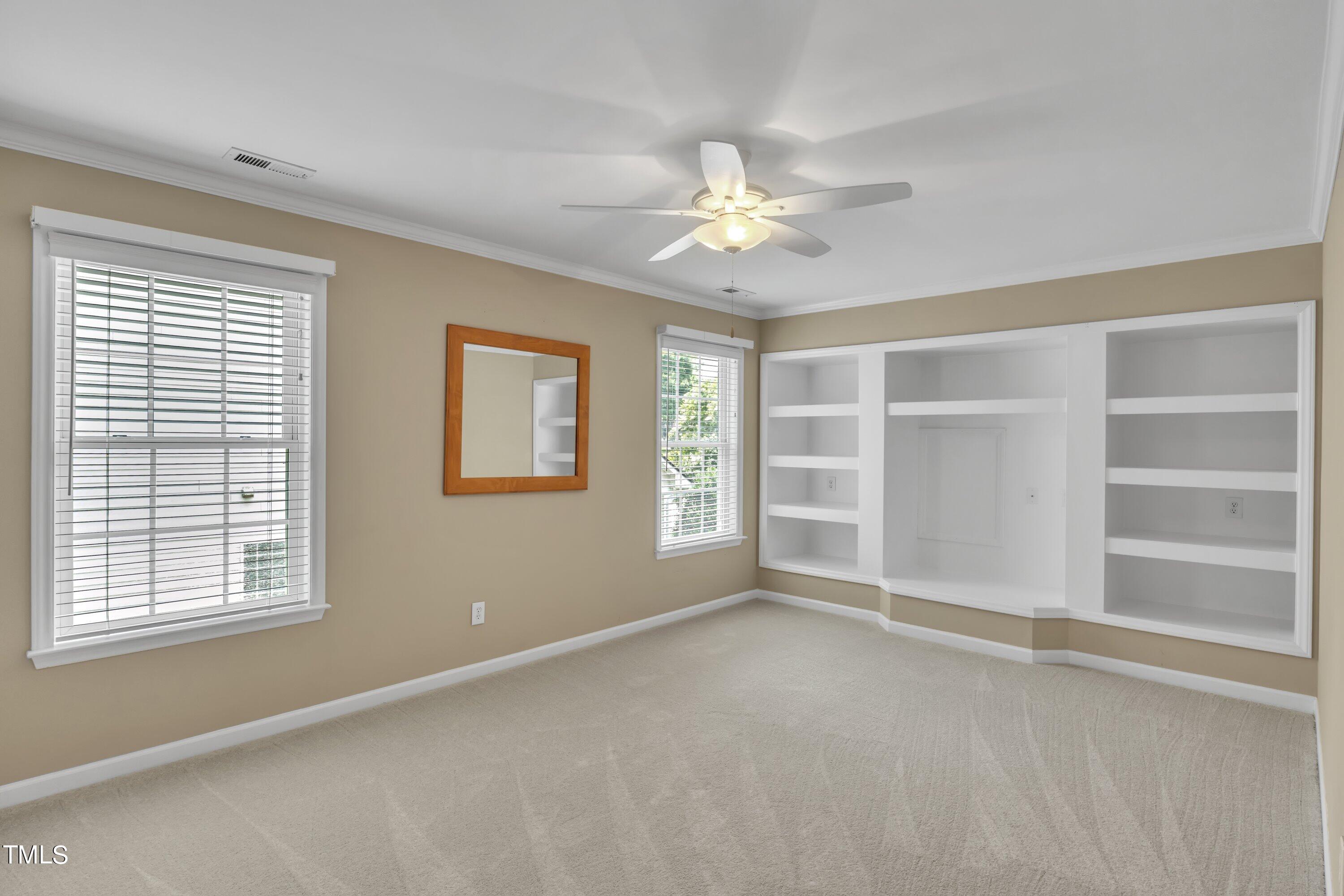 12208 Jasmine Cove Way Raleigh, NC 27614 - Photo 37 of 57 a view of an empty room with a window