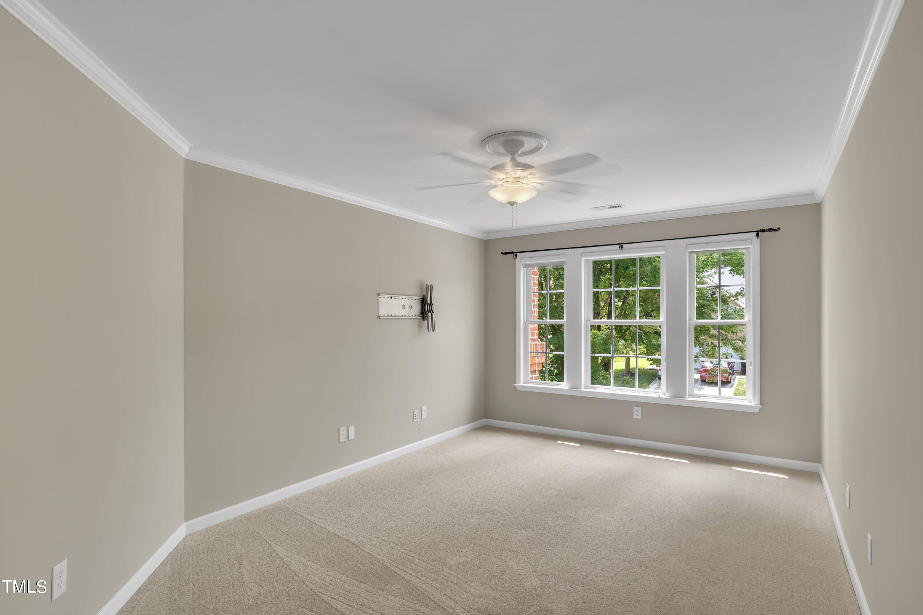 12208 Jasmine Cove Way Raleigh, NC 27614 - Photo 38 of 57 an empty room with a window