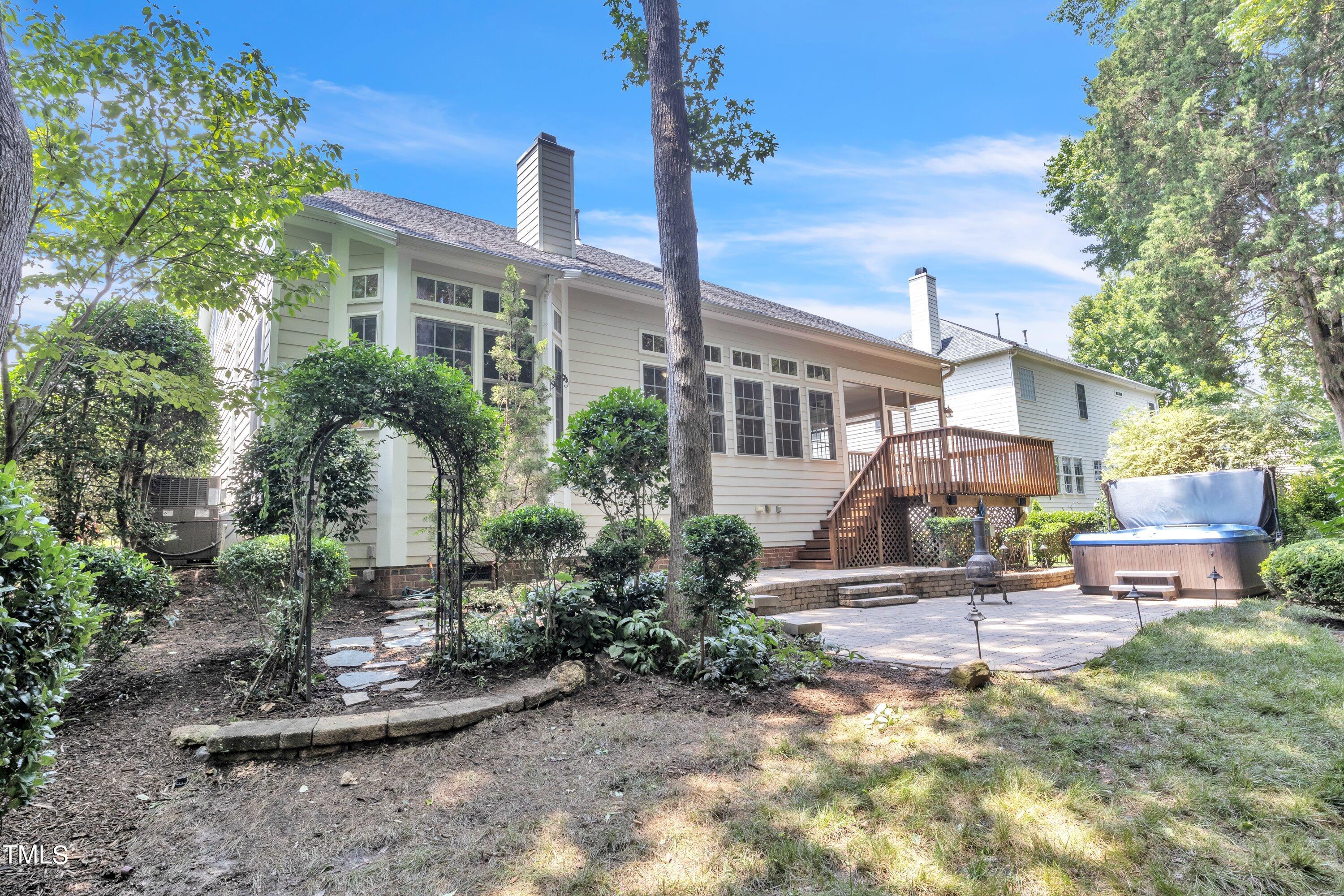 12208 Jasmine Cove Way Raleigh, NC 27614 - Photo 48 of 57 a house view with a garden space