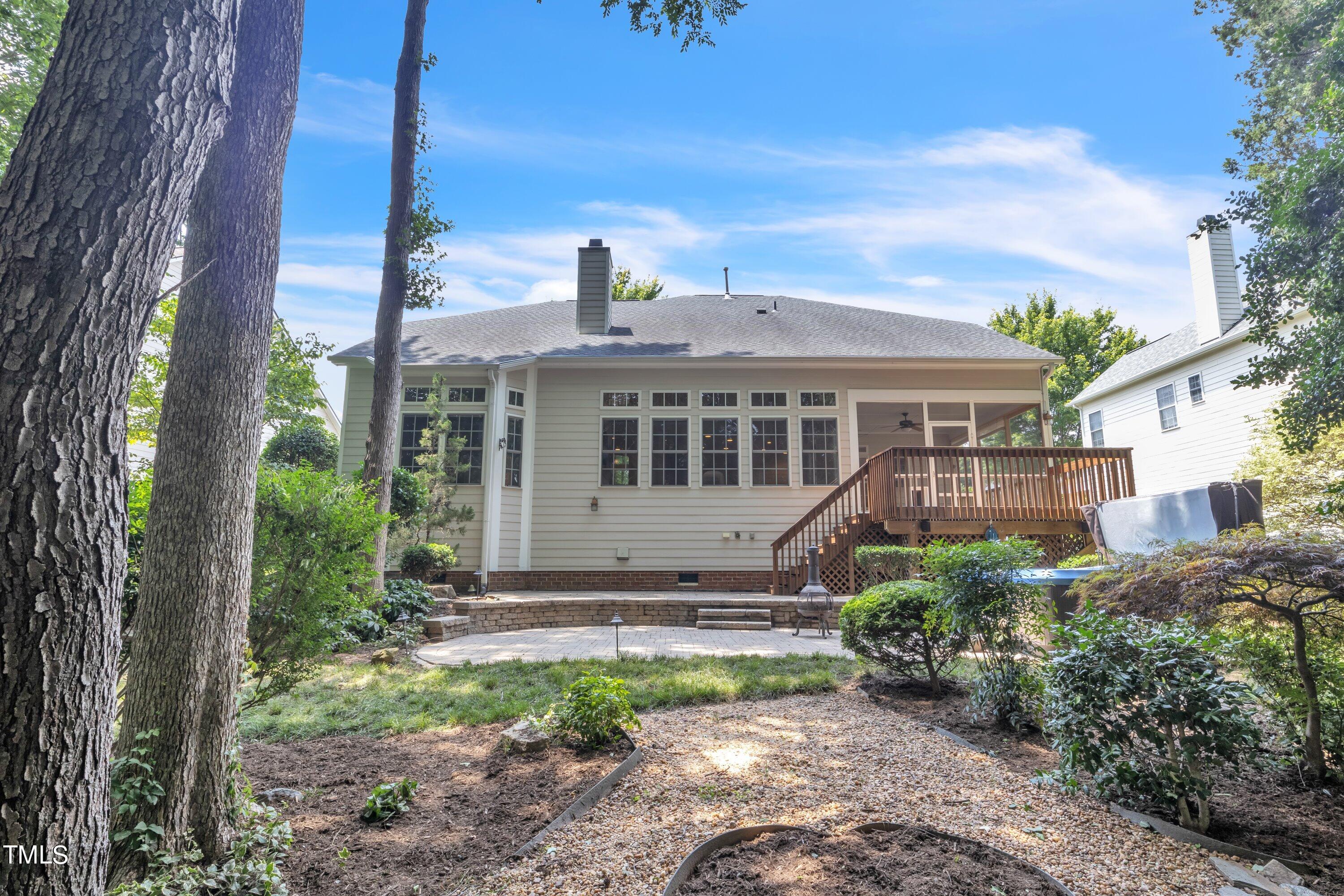 12208 Jasmine Cove Way Raleigh, NC 27614 - Photo 52 of 57 a view of a house with a yard
