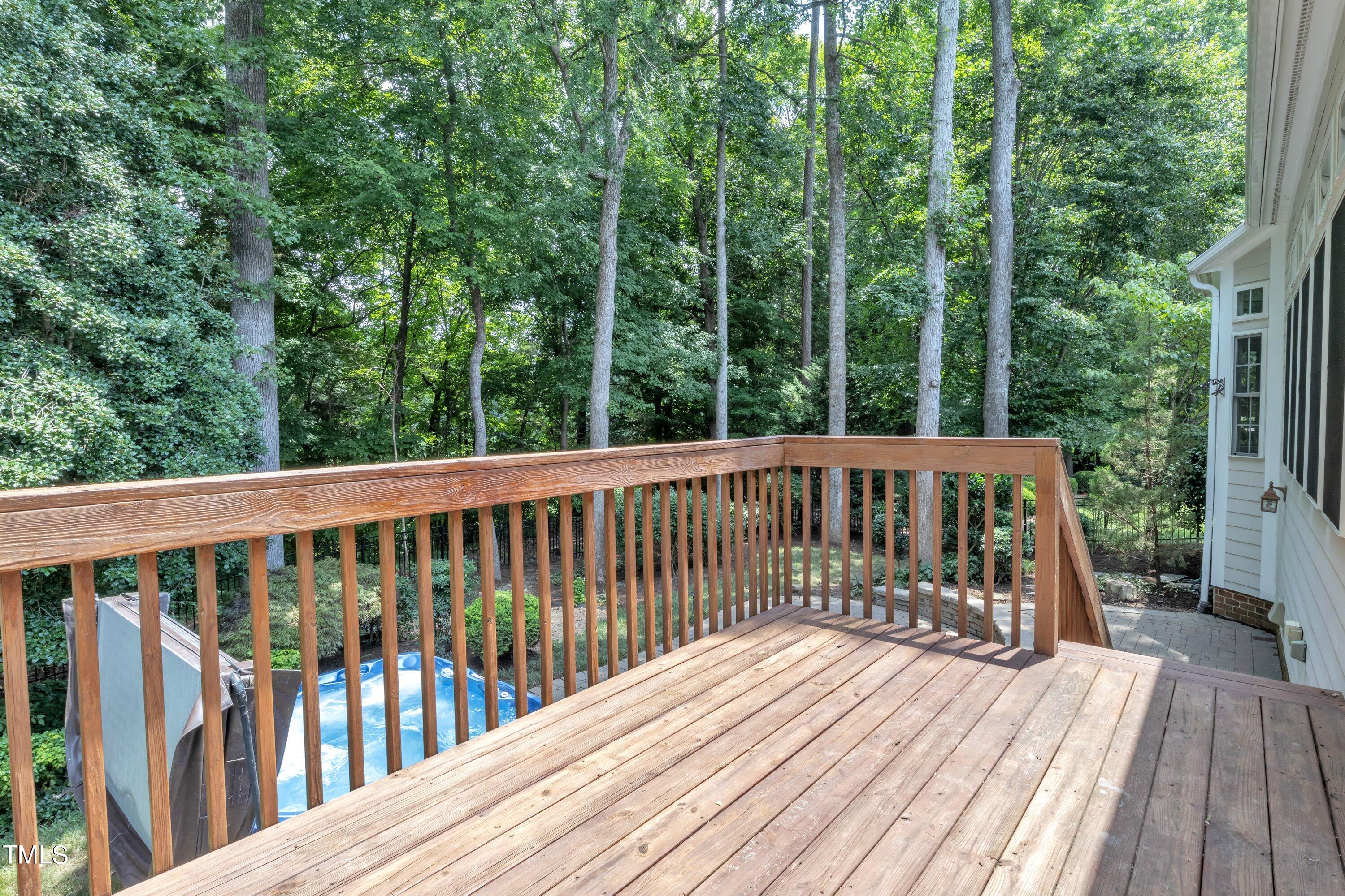 12208 Jasmine Cove Way Raleigh, NC 27614 - Photo 53 of 57 a view of balcony with deck and trees