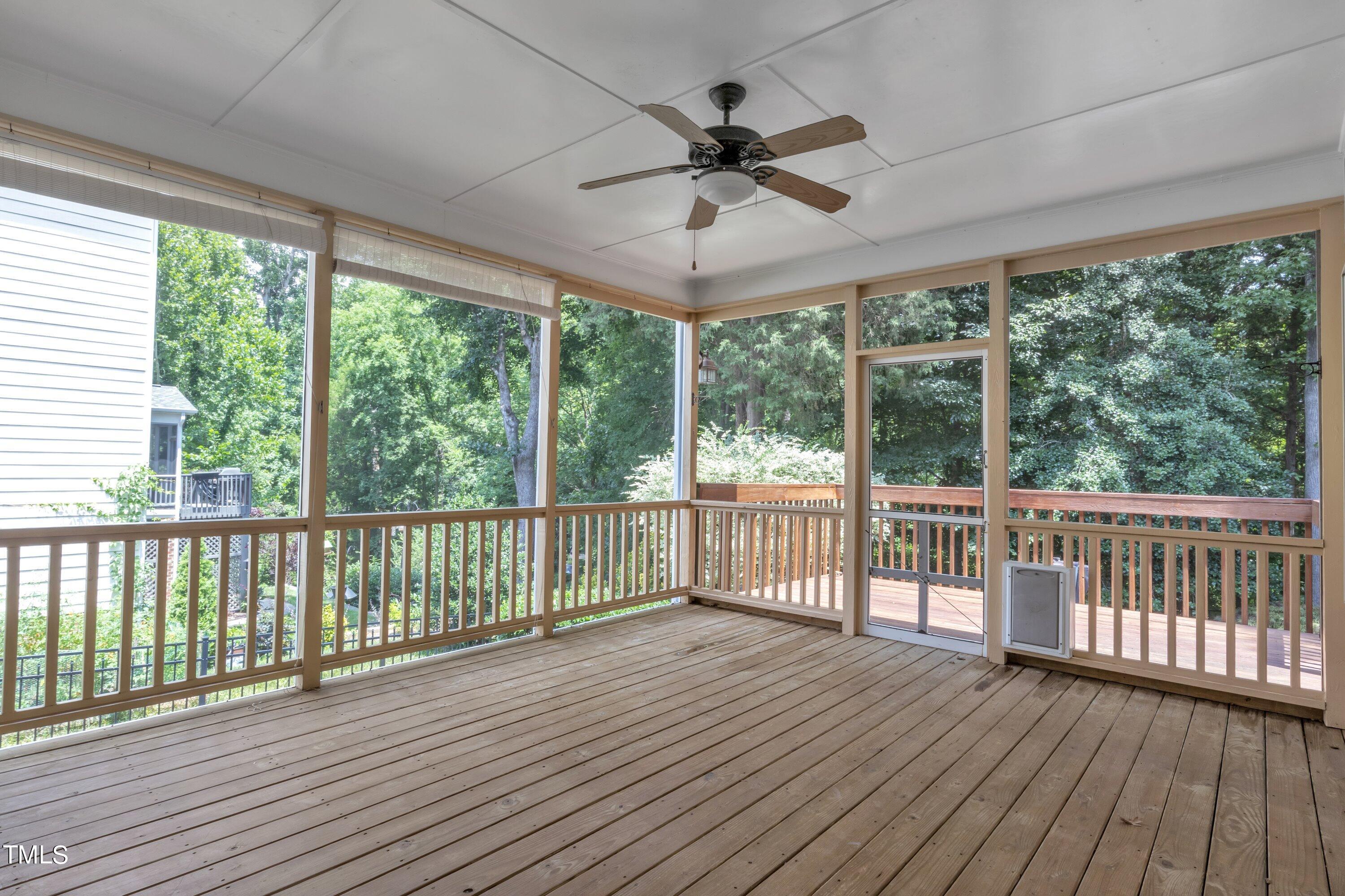 12208 Jasmine Cove Way Raleigh, NC 27614 - Photo 54 of 57 a view of a porch with wooden floor and outdoor space