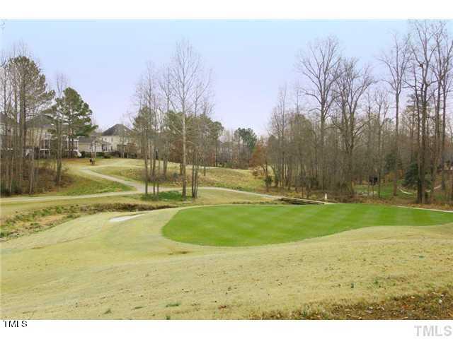 12208 Jasmine Cove Way Raleigh, NC 27614 - Photo 55 of 57 a view of a swimming pool with an outdoor space and seating area