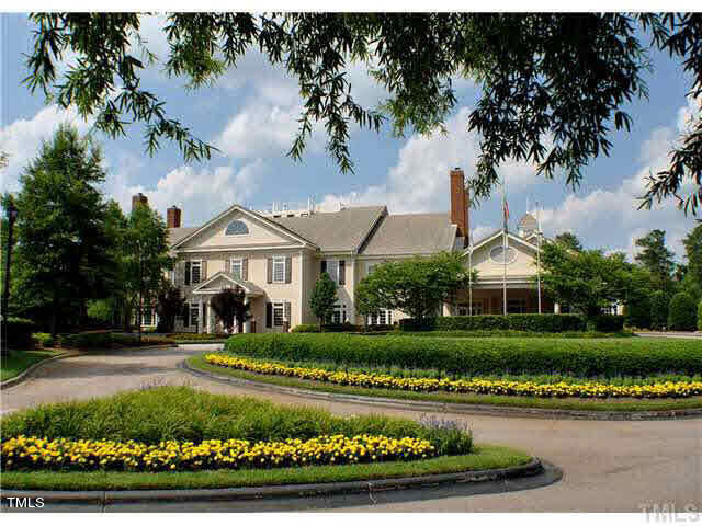 12208 Jasmine Cove Way Raleigh, NC 27614 - Photo 57 of 57 a front view of a house with a garden