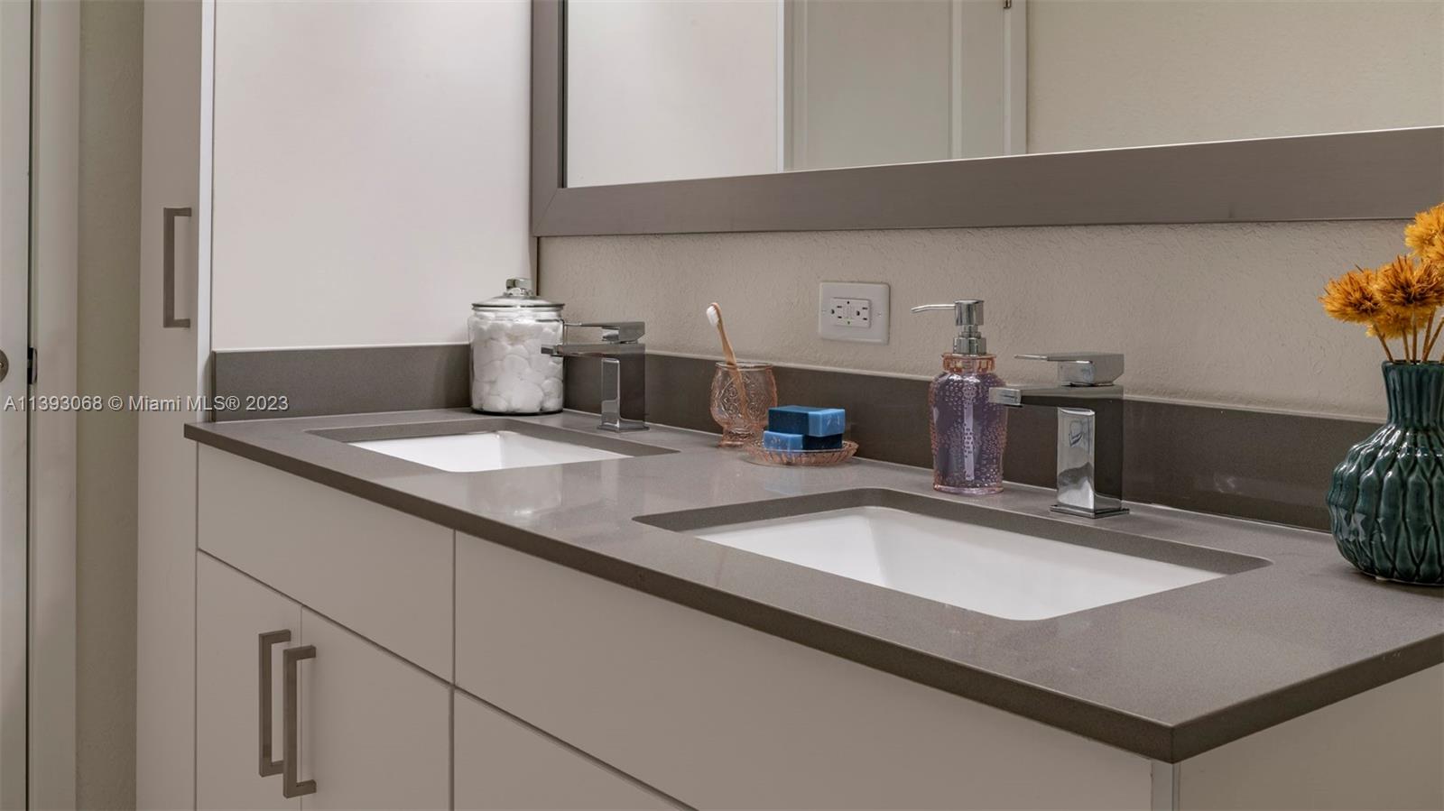 2701 Biscayne Boulevard, Unit 6217 Miami, FL 33137 - Photo 16 of 45 a kitchen with sink and a refrigerator