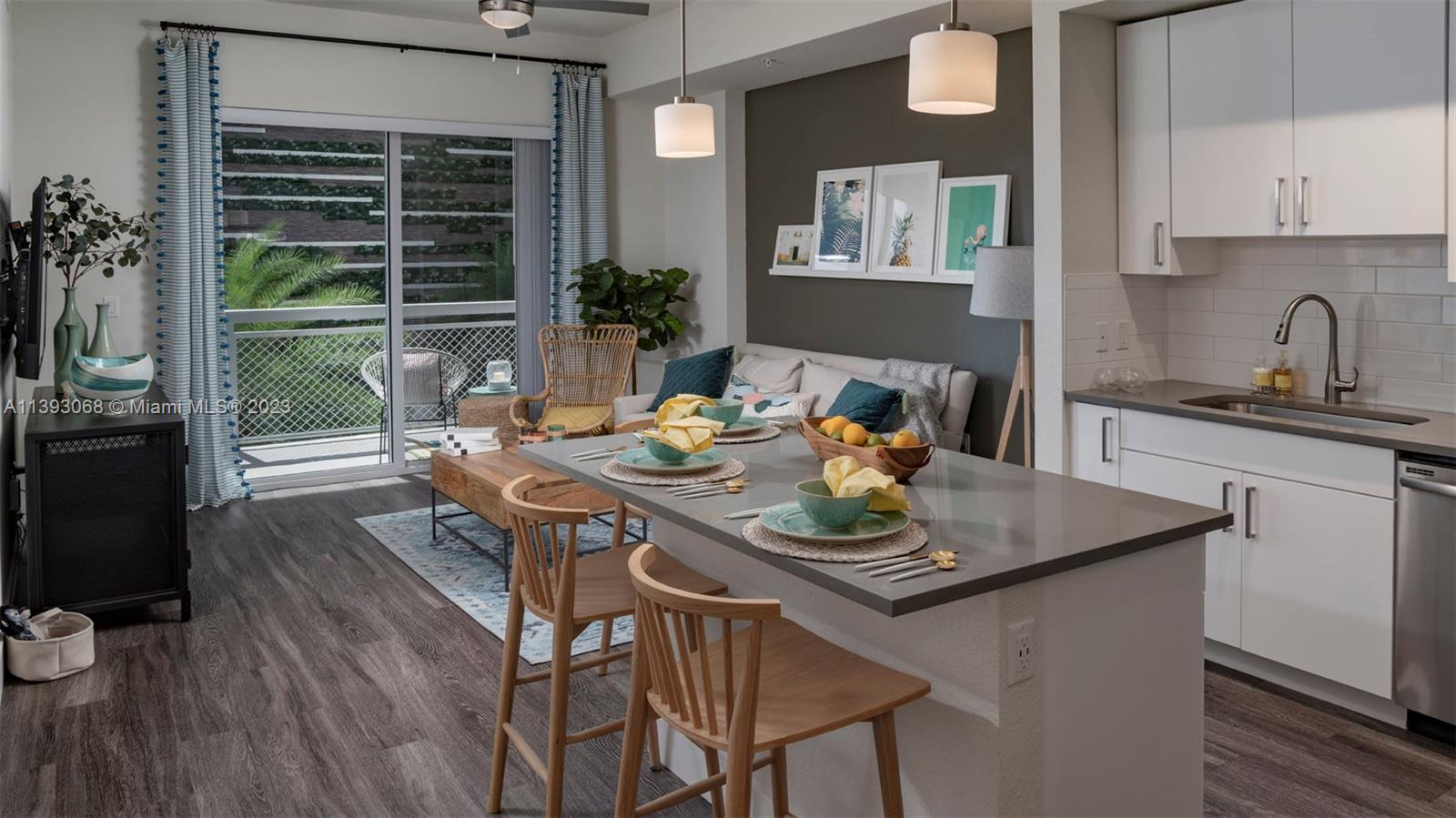 2701 Biscayne Boulevard, Unit 6217 Miami, FL 33137 - Photo 22 of 45 a view of a dining room with furniture window and wooden floor