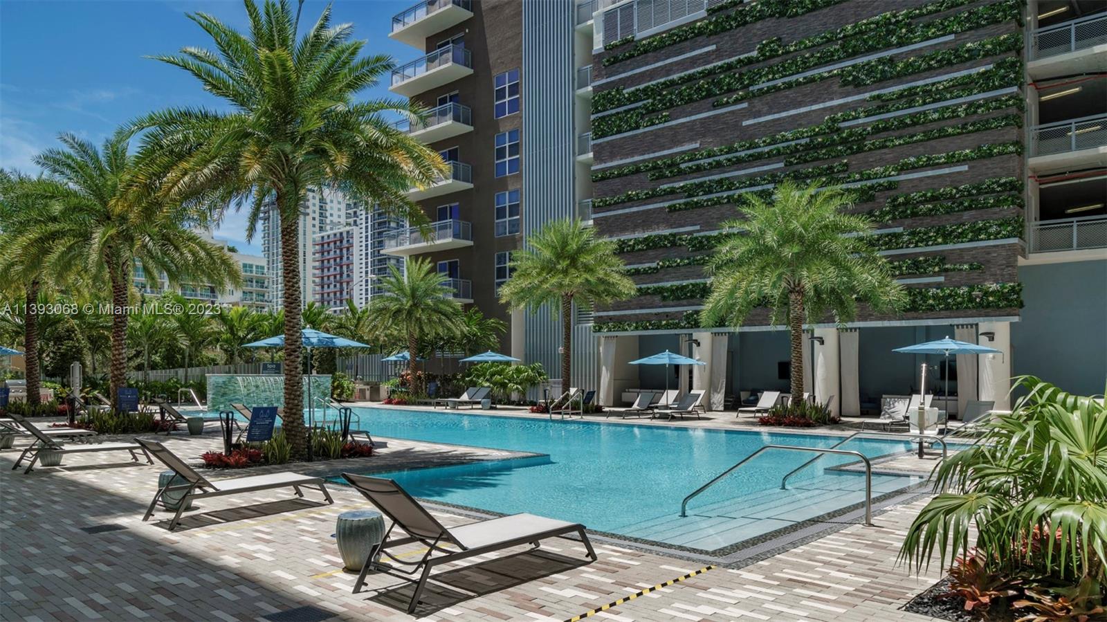 2701 Biscayne Boulevard, Unit 6217 Miami, FL 33137 - Photo 32 of 45 a view of a yard with a patio