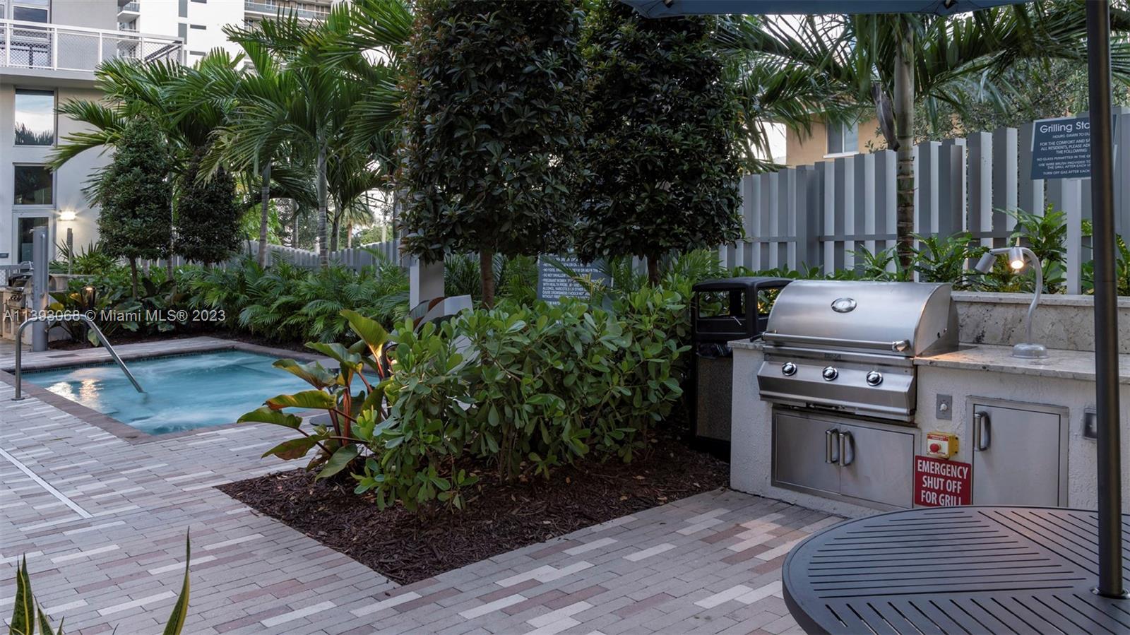 2701 Biscayne Boulevard, Unit 6217 Miami, FL 33137 - Photo 41 of 45 a view of a backyard with sitting area