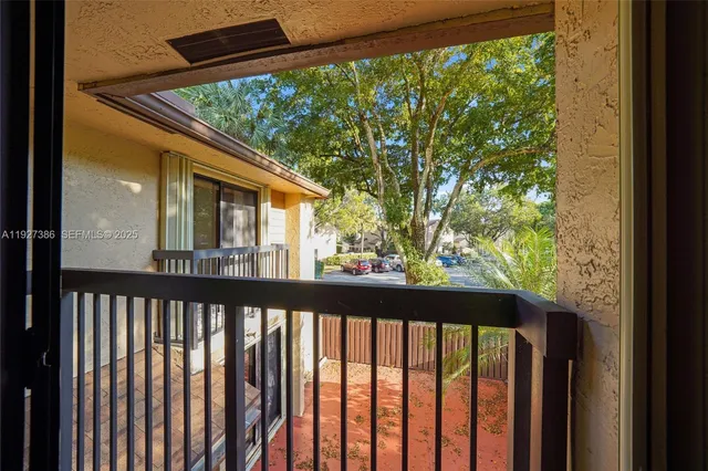 a view of a balcony with an outdoor space