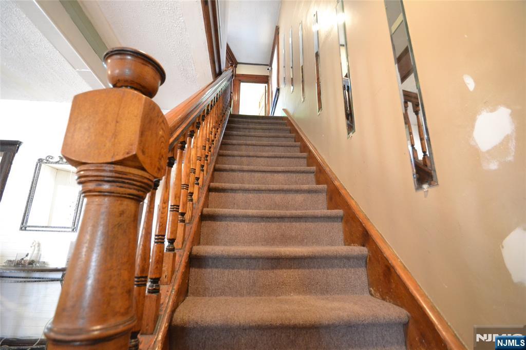 655 Chestnut Street Kearny, NJ 07032 - Photo 14 of 31 a view of entryway and hall with wooden floor
