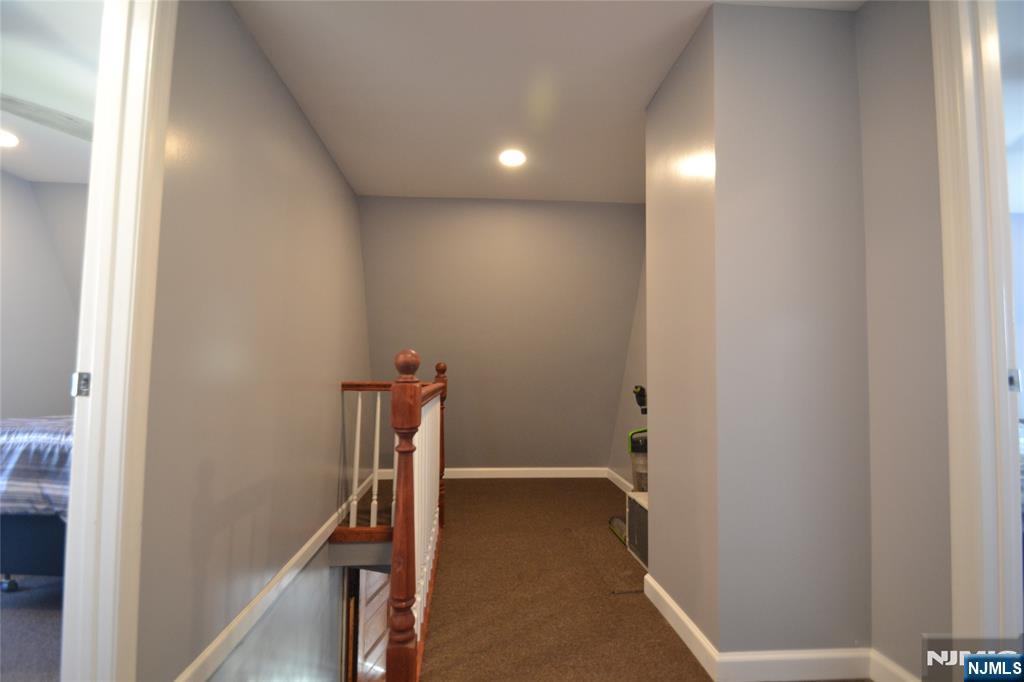 655 Chestnut Street Kearny, NJ 07032 - Photo 21 of 31 a view of hallway with stairs