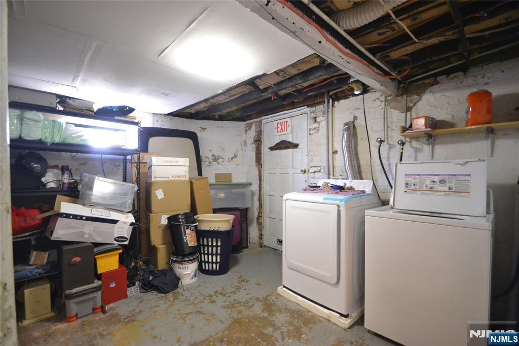 655 Chestnut Street Kearny, NJ 07032 - Photo 28 of 31 a view of storage and utility room with washer and dryer