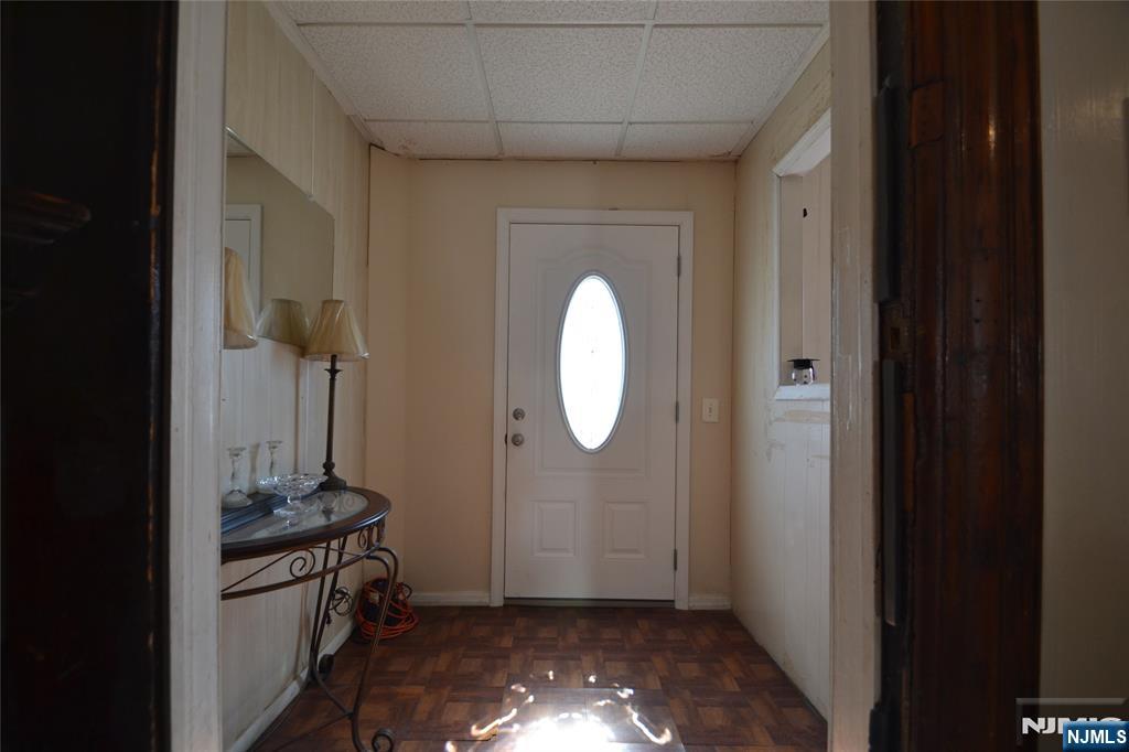 655 Chestnut Street Kearny, NJ 07032 - Photo 7 of 31 a view of a livingroom with wooden floor and a sink