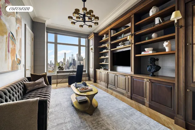 a workspace with furniture and wooden floor