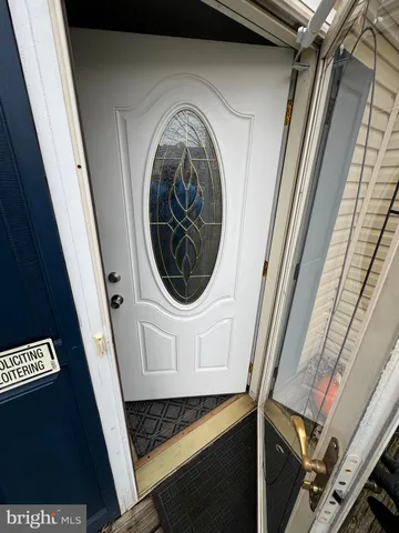 a view of a livingroom with furniture and window