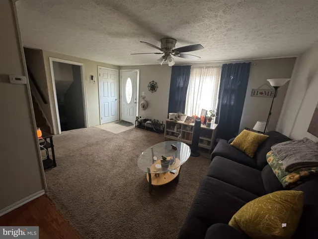a kitchen with a table and chairs in it