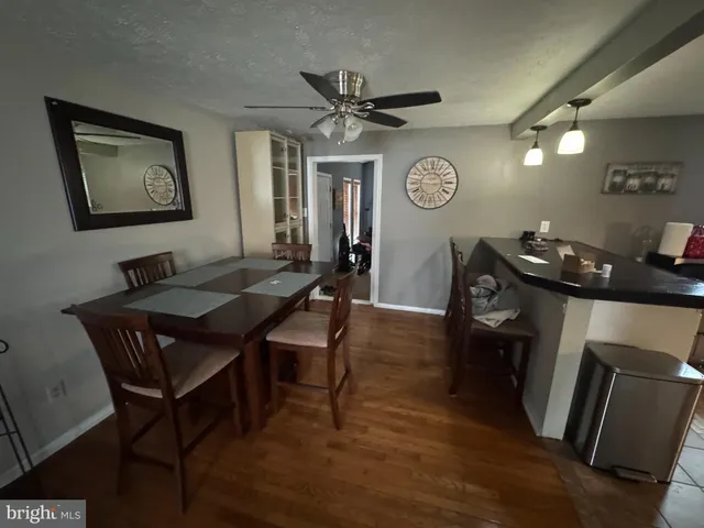 a room with gym equipment and a flat screen tv