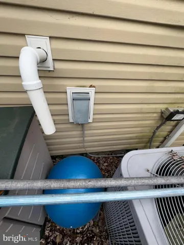 a room with furniture and wooden floor