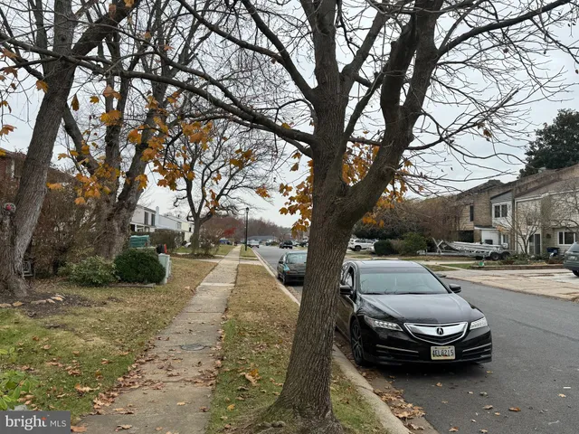a car parked in front of a house