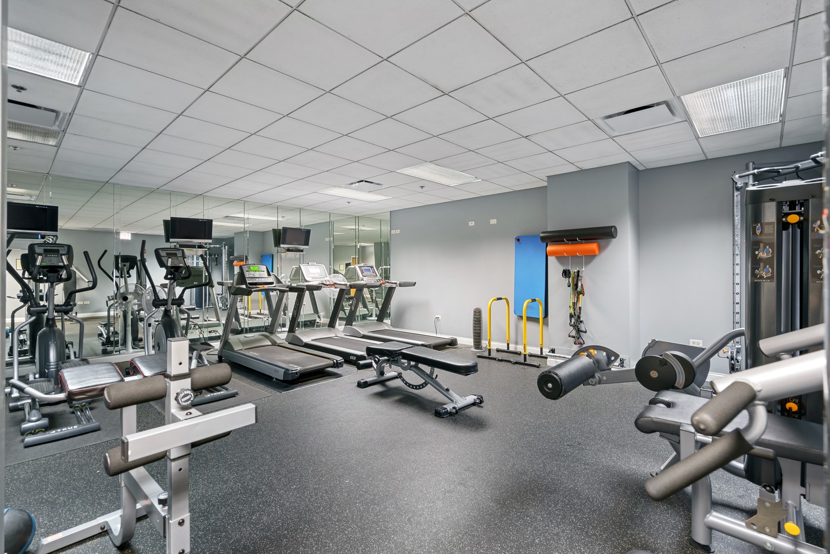 8 West Monroe Street, Unit 500 Chicago, IL 60603 - Photo 12 of 14 a view of a room with gym equipment