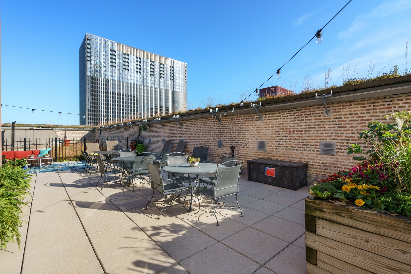 8 West Monroe Street, Unit 500 Chicago, IL 60603 - Photo 13 of 14 a view of backyard with outdoor seating and plants