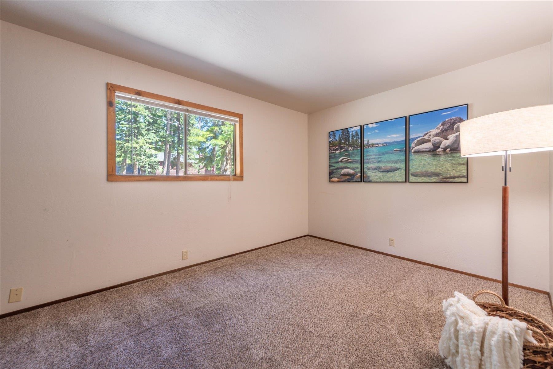 325 North Ridge Road Carnelian Bay, CA 96140 - Photo 18 of 22 a view of an empty room with a window