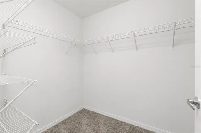 a view of a room with racks on the wall