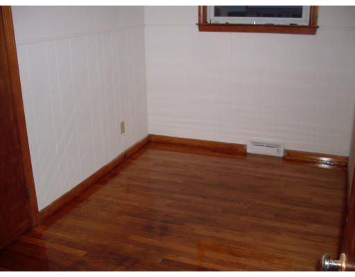 131 Hudson Street Springfield, MA 01118 - Photo 3 of 8 a view of a room with wooden floor