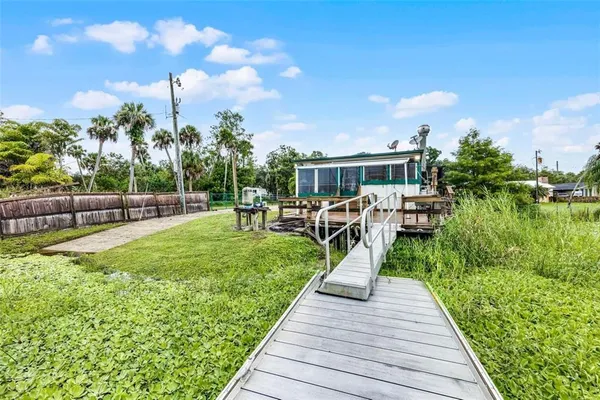 a view of a garden with houses