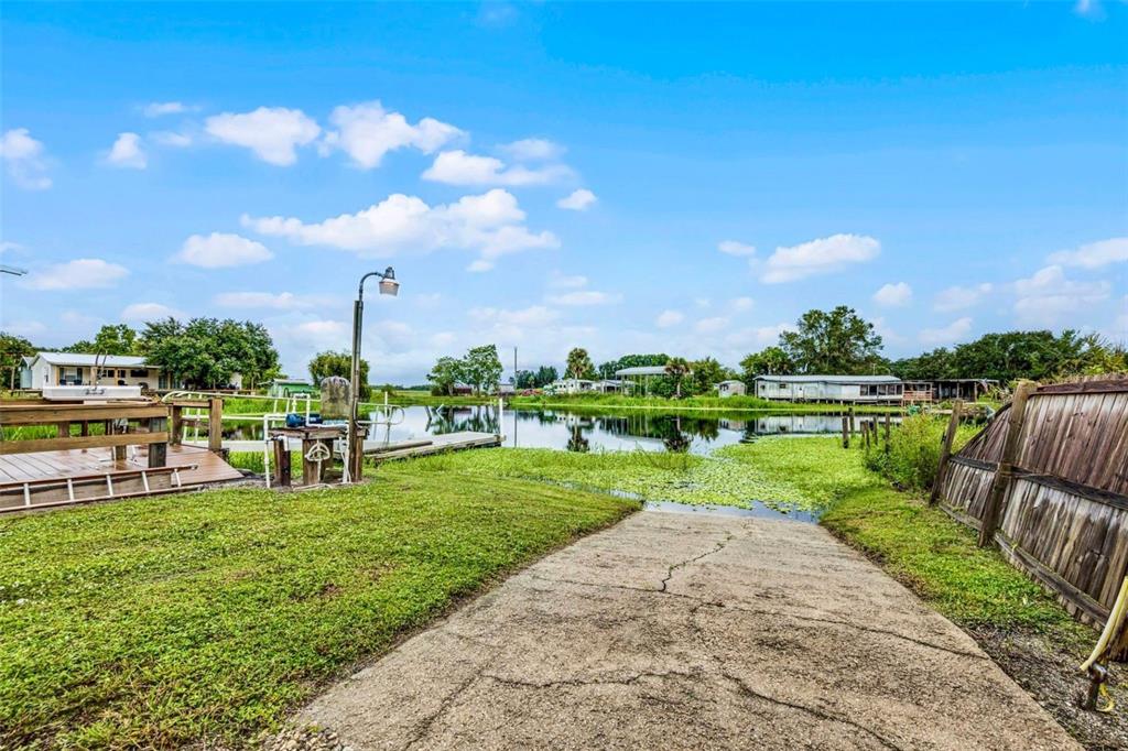 8270 Baxter Point North Mims, FL 32754 - Photo 33 of 50 a view of a garden with houses