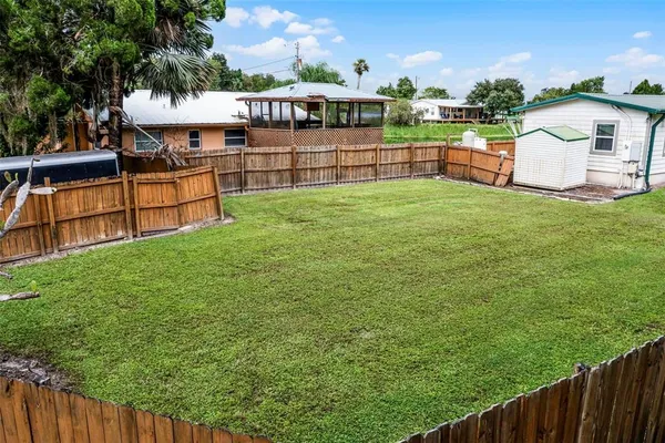 a view of a backyard with a garden