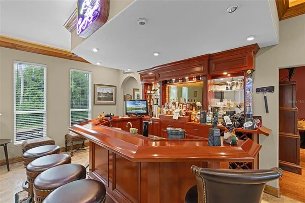 a room with chairs and tables