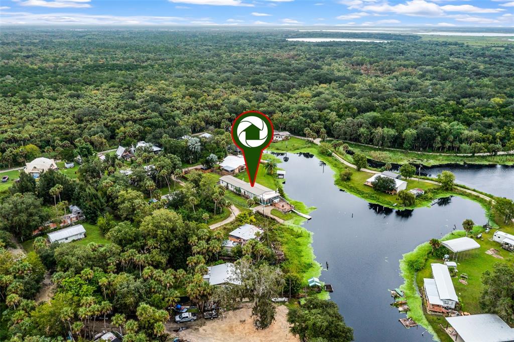 8270 Baxter Point North Mims, FL 32754 - Photo 42 of 50 a view of a lake with a mountain