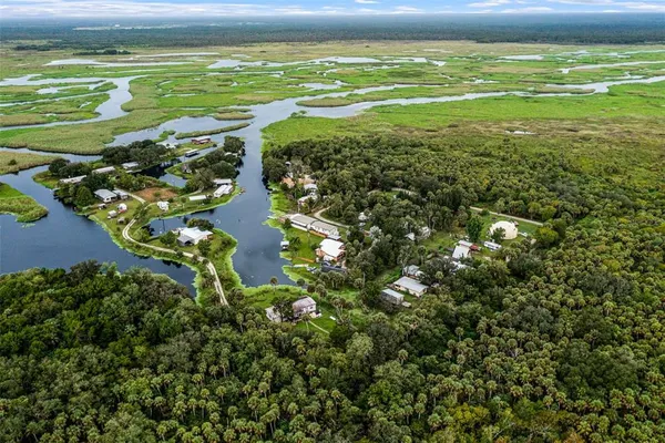 a view of a lake with a house